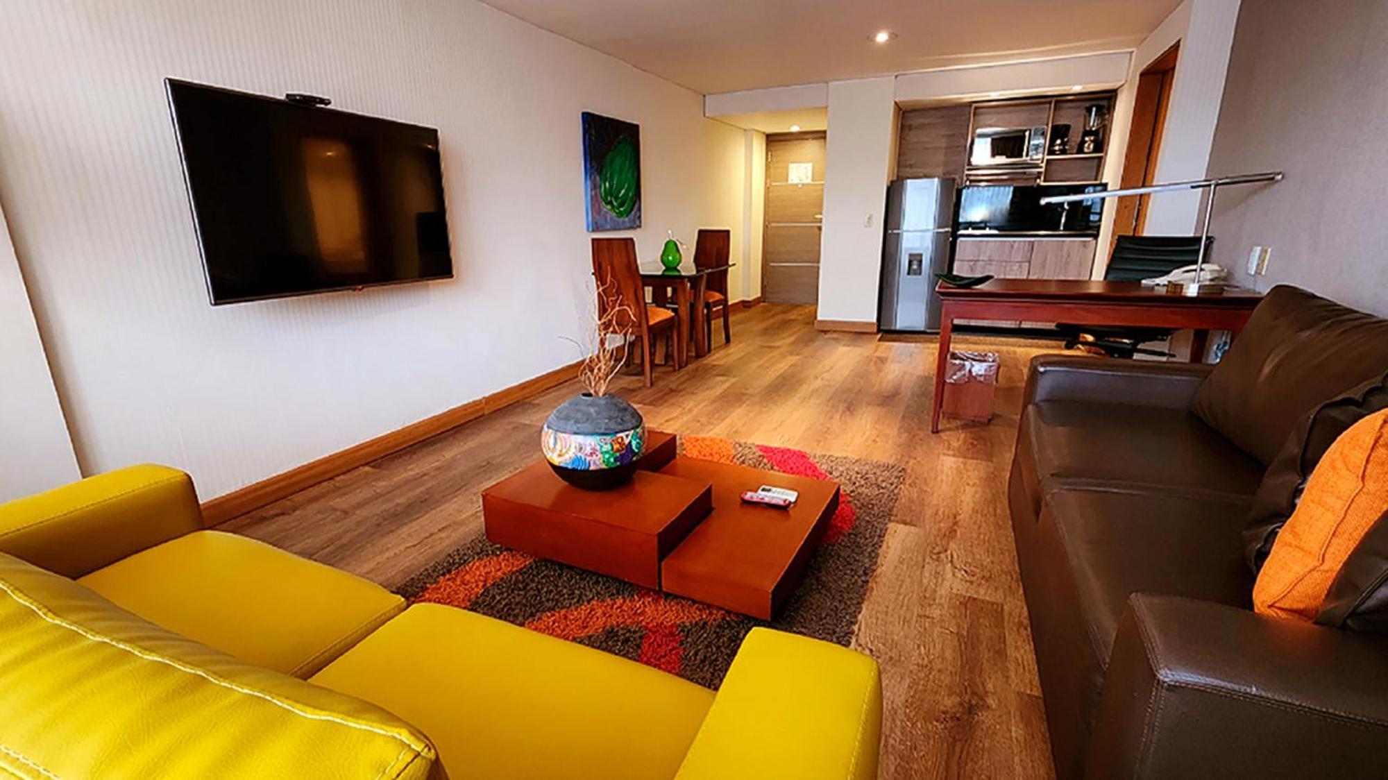 Bogota Plaza Hotel Exterior foto A living room in a serviced apartment in Lima, Peru